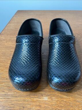 Dansko XP Professional Clogs in a navy blue snakeskin patent leather finish. 41